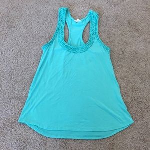 Teal razorback tank top with ruffle details